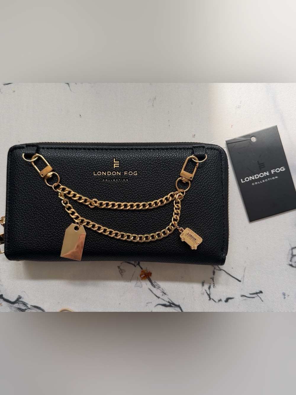 London Fog Leather long wallet .  Gold hardware .  NWT